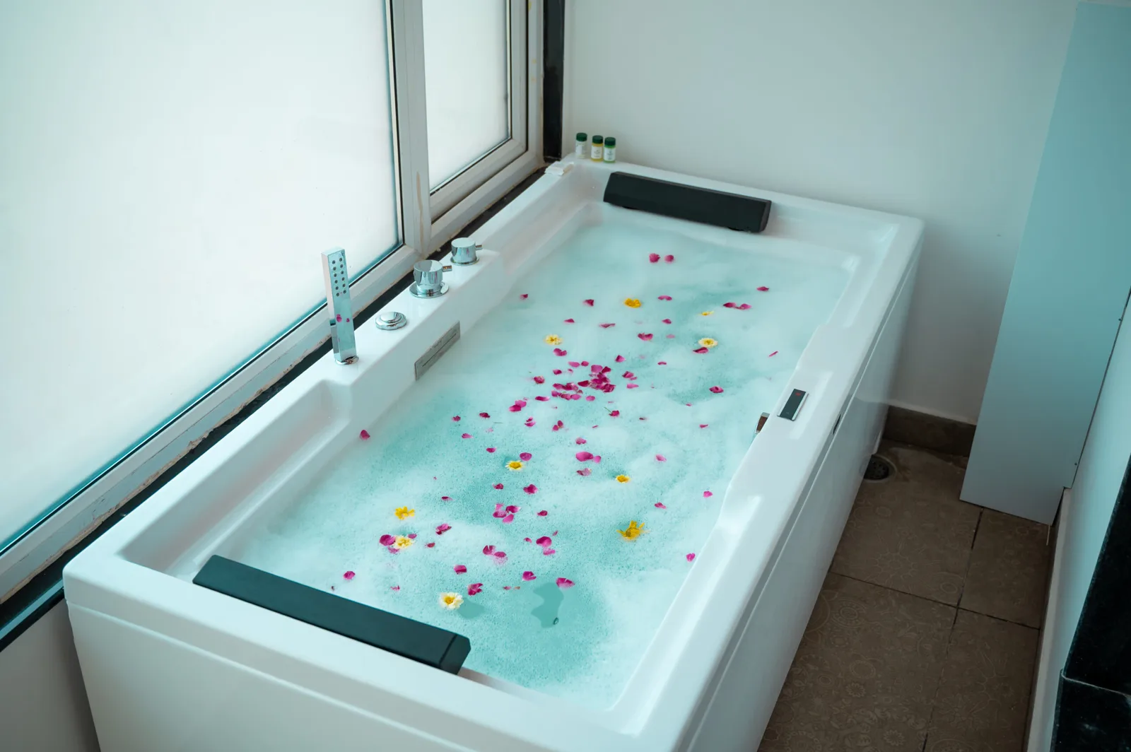 Bathtub with flower petals