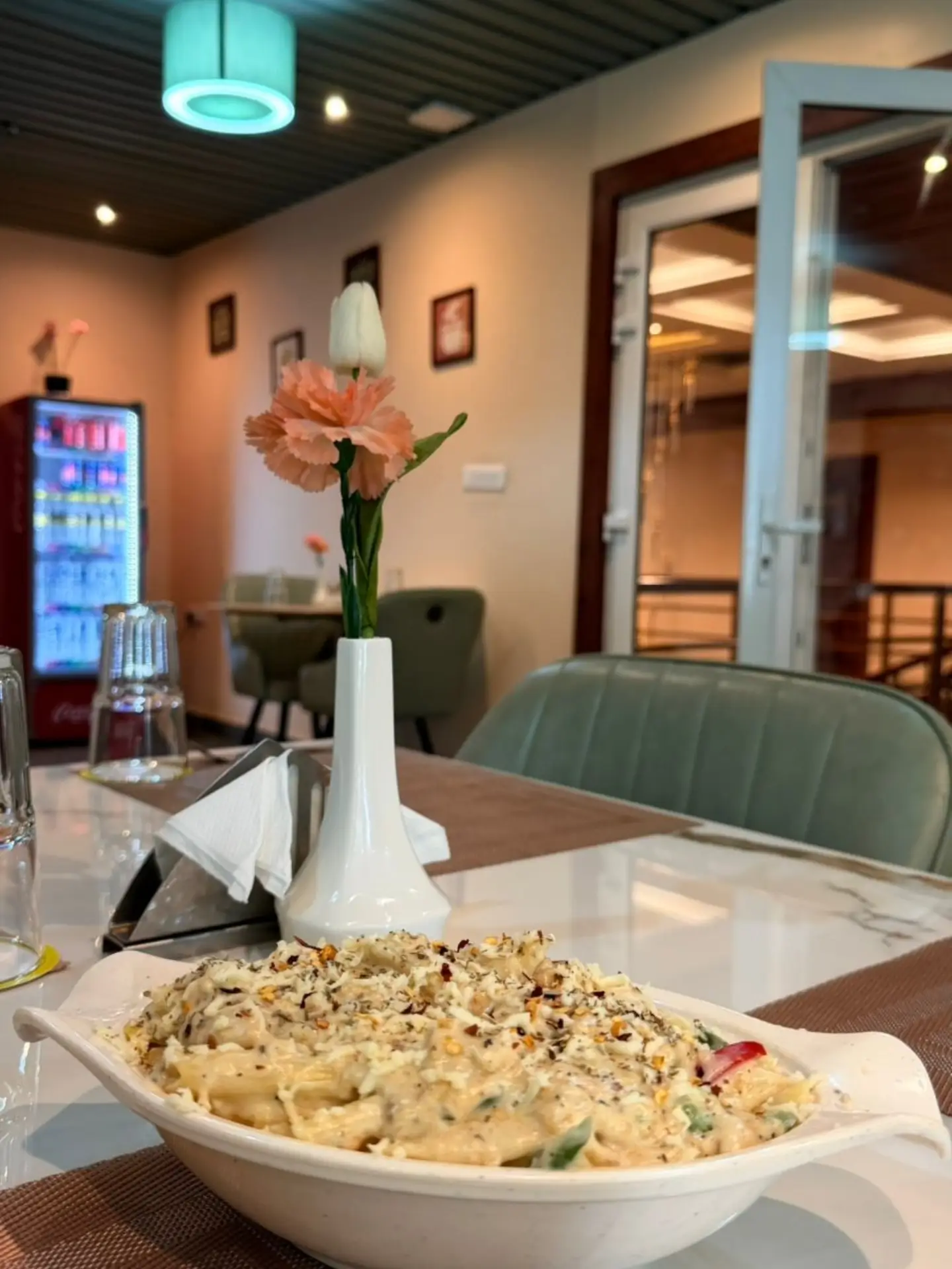 Creamy herbed pasta served at Vestta Restaurant